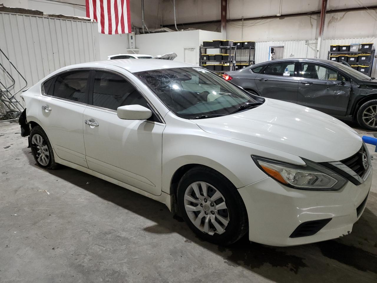 2016 Nissan Altima VIN 1N4AL3AP2GN346997 Copart auction photo, rear end / minor dent/scratches damage thumbnail 4