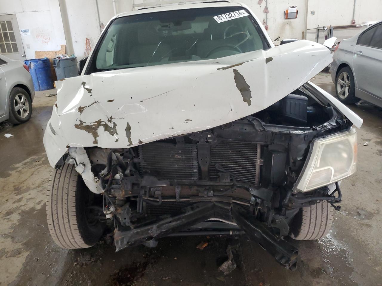 2015 Nissan Navara (Frontier) VIN 1N6BD0CT4FN700597 Copart auction photo, front end / side damage thumbnail 5