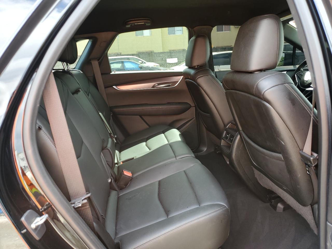 2021 Cadillac XT5 VIN 1GYKNAR46MZ127028 Copart auction photo, front end / side damage thumbnail 11