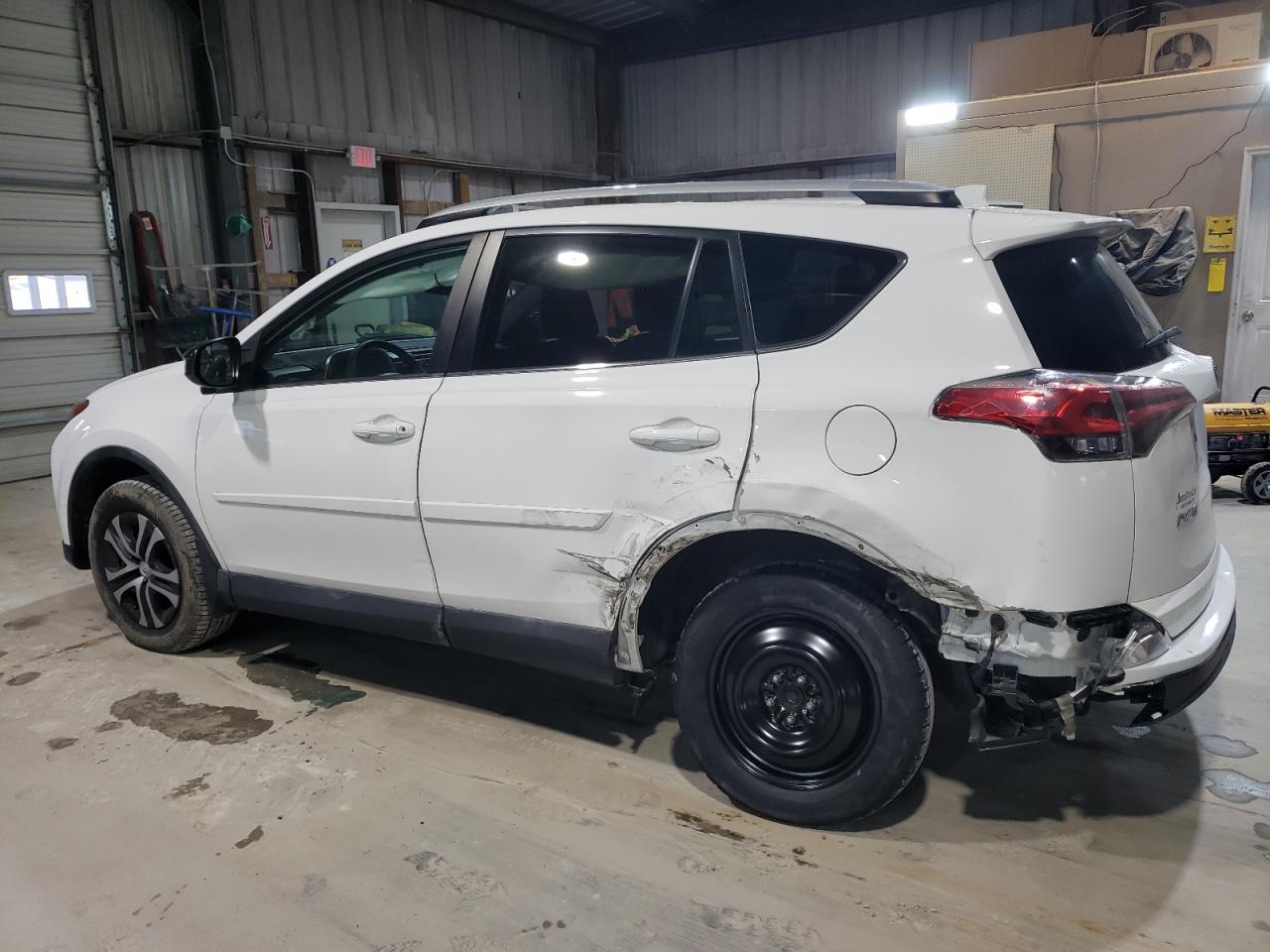 2016 Toyota RAV 4 VIN 2T3ZFREV6GW295531 Copart auction photo, side / rear end damage thumbnail 2