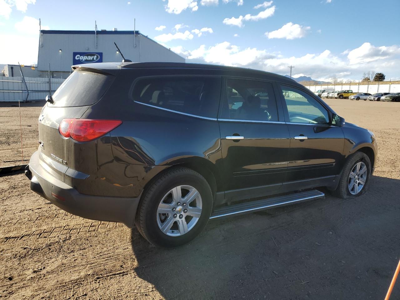 2010 Chevrolet Traverse VIN 1GNLVFED7AS112773 Copart auction photo, side / front end damage thumbnail 3