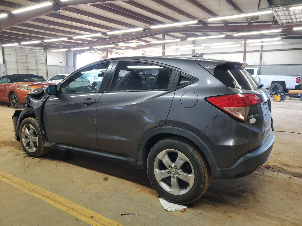2016 Honda HR-V VIN 3CZRU5H39GM712399 Copart auction photo, front end / side damage thumbnail 2