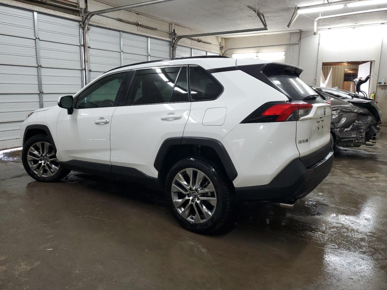 2020 Toyota RAV 4 VIN 2T3C1RFV3LW059416 Copart auction photo, side / undercarriage damage thumbnail 2