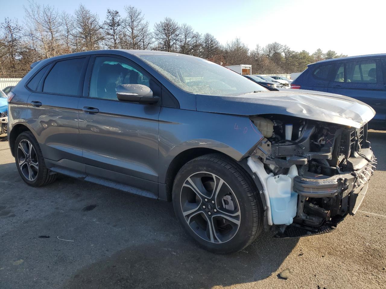 2023 Ford Edge VIN 2FMPK4AP3PBA12689 Copart auction photo, front end / minor dent/scratches damage thumbnail 4