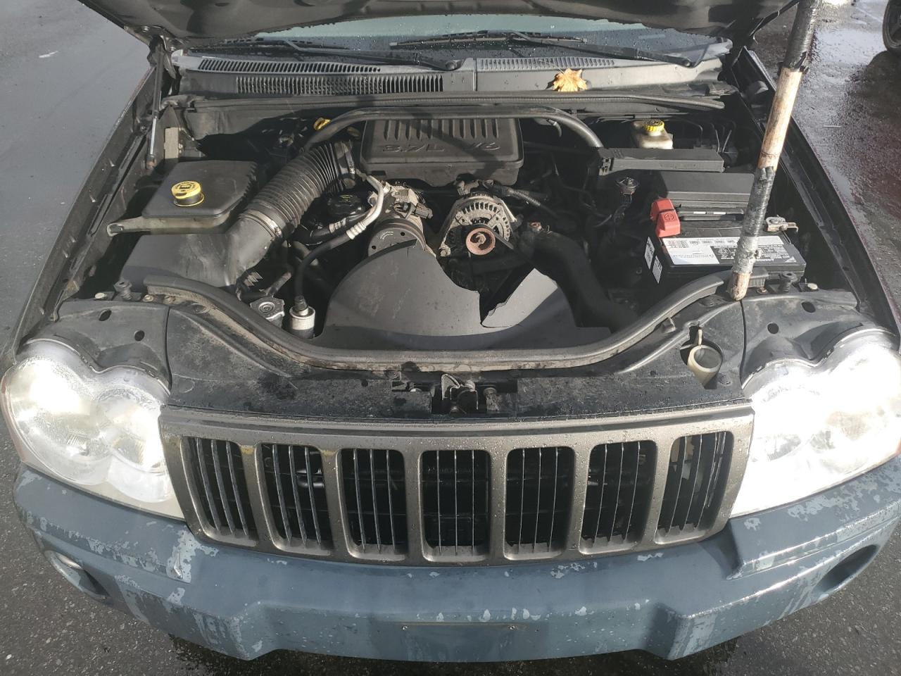 2005 Jeep Grand Cherokee VIN 1J4GR48K05C724904 Copart auction photo, side damage thumbnail 12