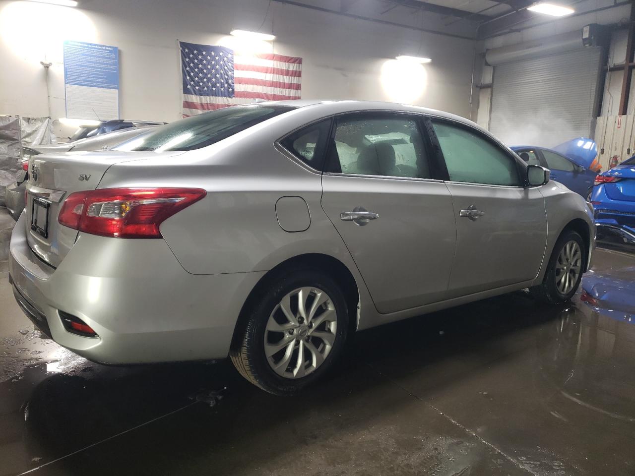 2019 Nissan Sentra VIN 3N1AB7AP8KY372720 Copart auction photo, side / front end damage thumbnail 3