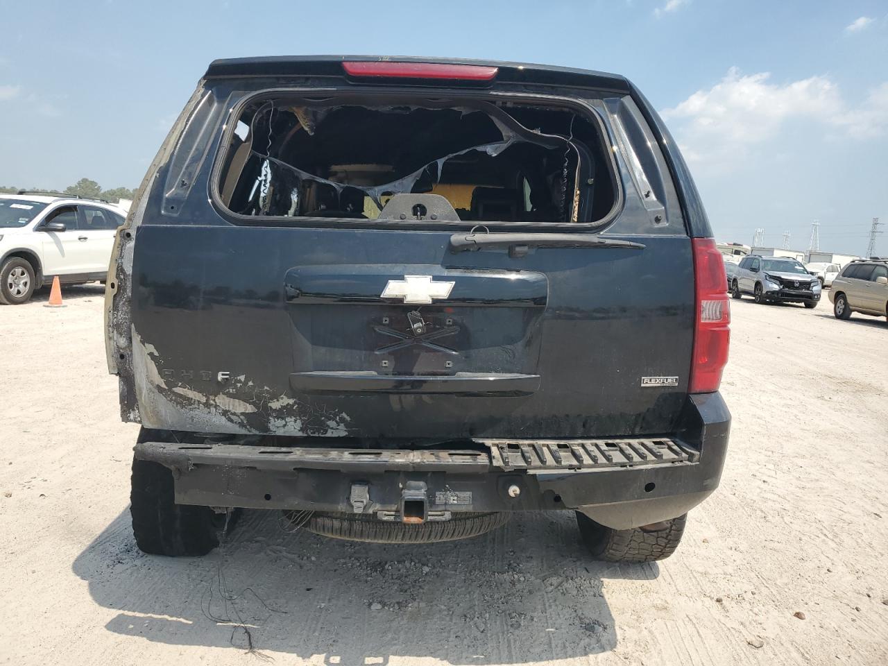 2009 Chevrolet Tahoe VIN 1GNFK23099R136820 Copart auction photo, burn damage thumbnail 6