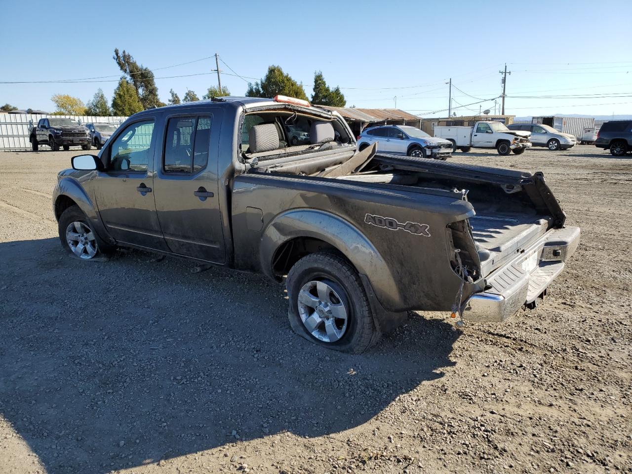 2009 Nissan Navara (Frontier) VIN 1N6AD09W59C409653 Copart auction photo, rollover damage thumbnail 2