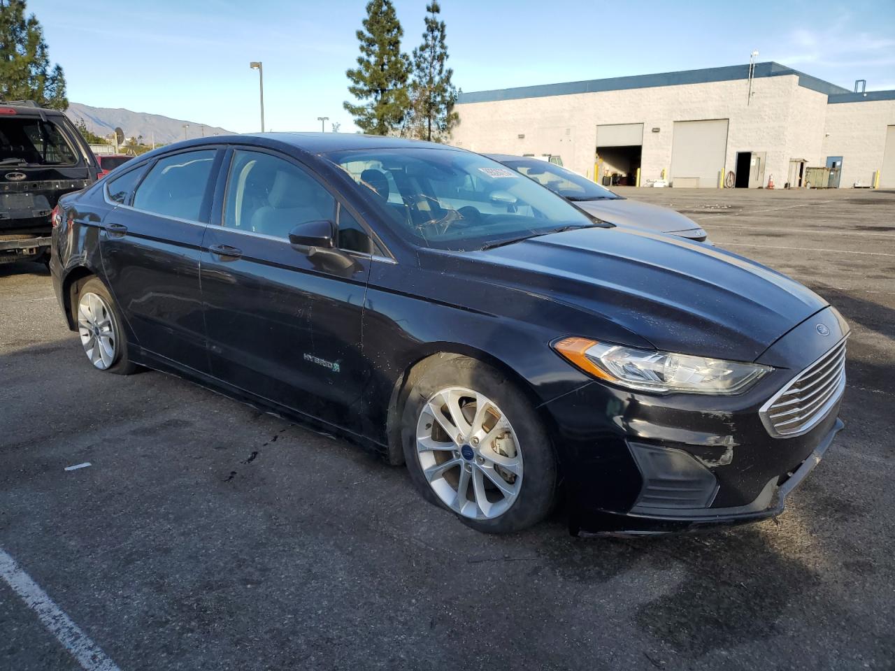 2019 Ford Fusion VIN 3FA6P0LU7KR139796 Copart auction photo, rear end damage thumbnail 4