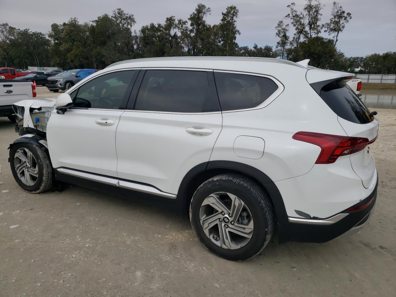2022 Hyundai Santa Fe VIN 5NMS24AJ8NH394582 Copart auction photo, front end / minor dent/scratches damage thumbnail 2