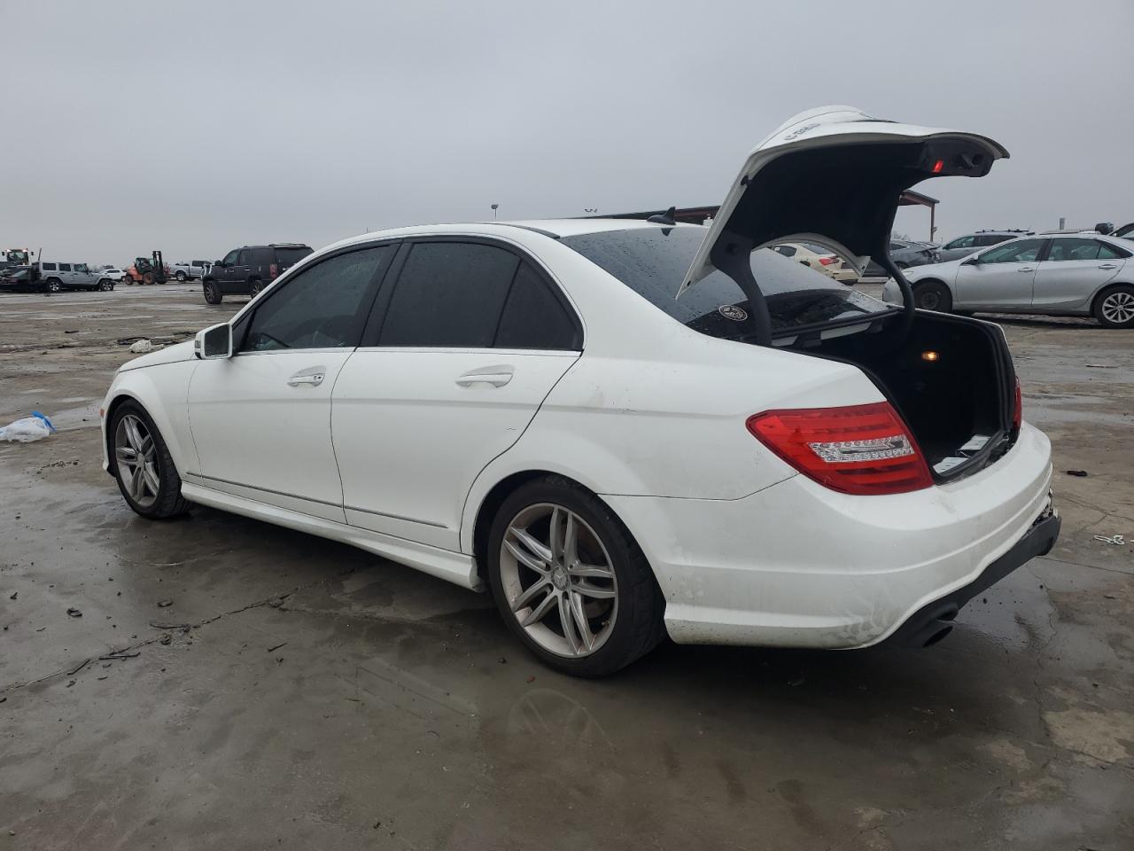 2014 Mercedes-Benz C-klasse VIN WDDGF4HB2EA935084 Copart auction photo, rear end / hail damage thumbnail 2