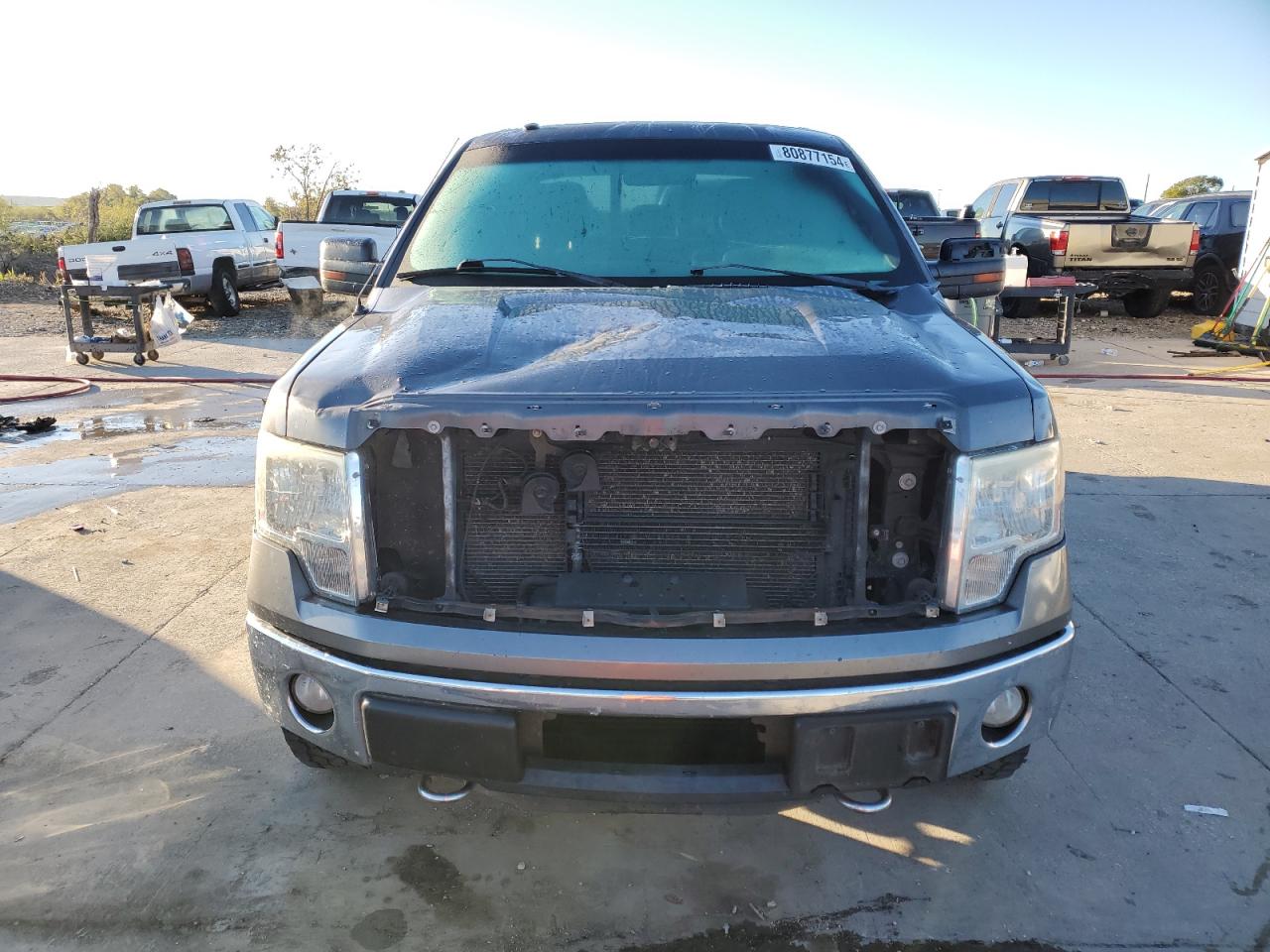 2012 Ford F-150 VIN 1FTFW1ET7CKD57525 Copart auction photo, front end / hail damage thumbnail 5