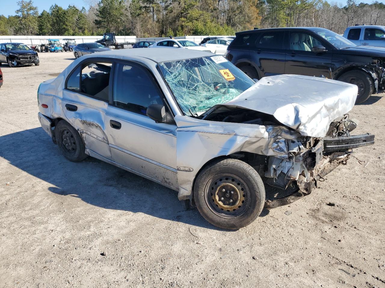 2002 Hyundai Accent VIN KMHCG45C02U308425 Copart auction photo, all over damage thumbnail 4