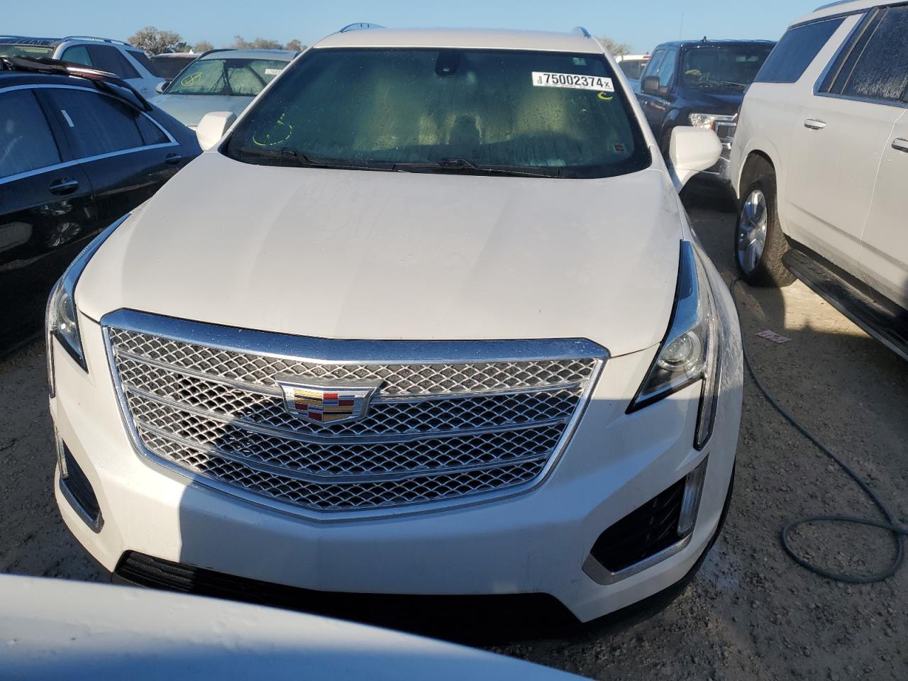 2018 Cadillac XT5 VIN 1GYKNARSXJZ128533 Copart auction photo, water/flood damage thumbnail 5