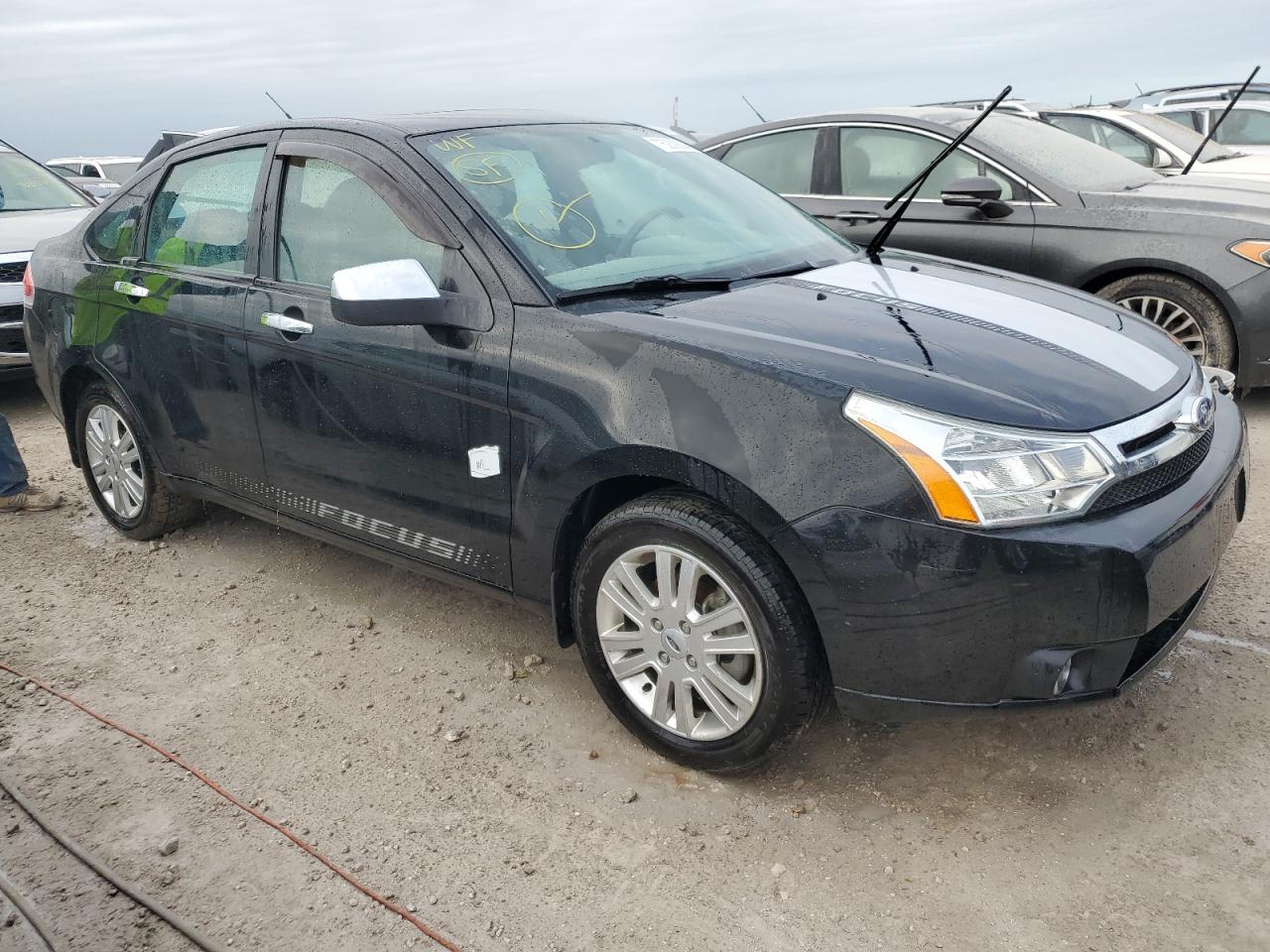 2011 Ford Focus VIN 1FAHP3HN7BW116334 Copart auction photo, water/flood damage thumbnail 4