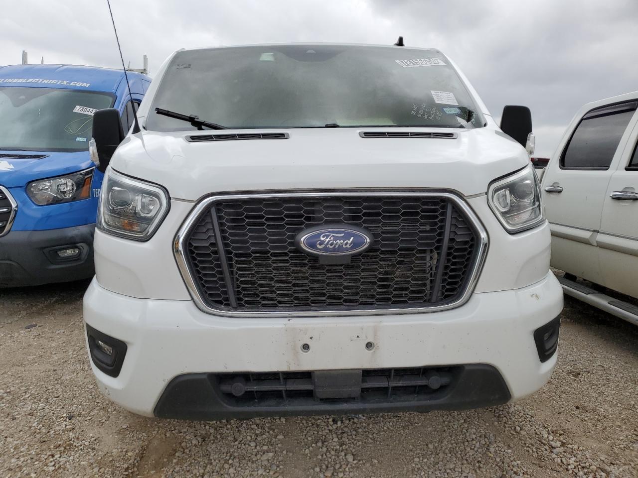 2023 Ford Transit VIN 1FBAX2YG7PKA64990 Copart auction photo, burn damage thumbnail 5