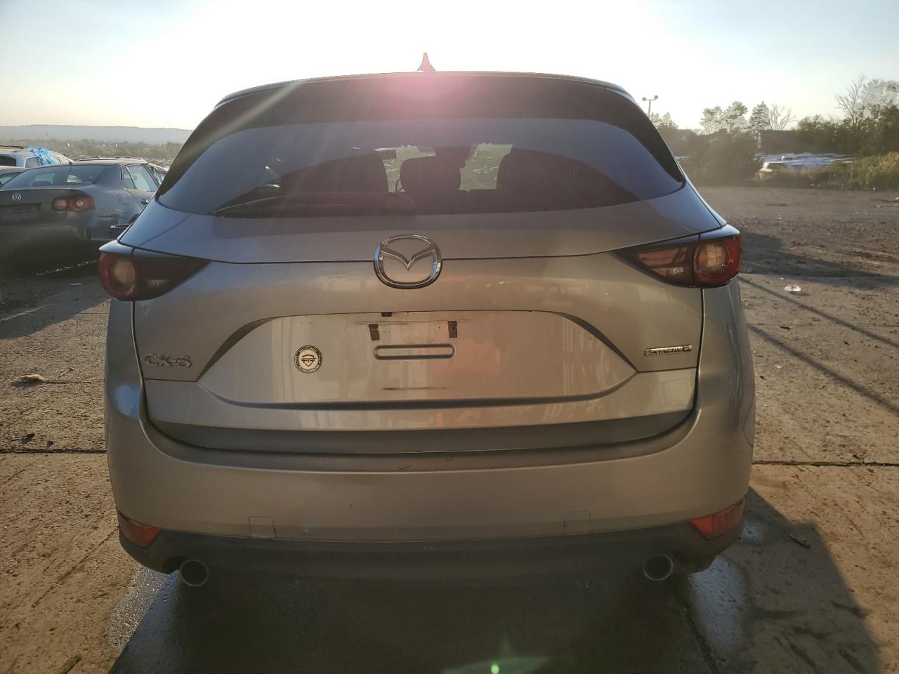 2020 Mazda CX-5 VIN JM3KFACM4L0768443 Copart auction photo, front end / top/roof damage thumbnail 6