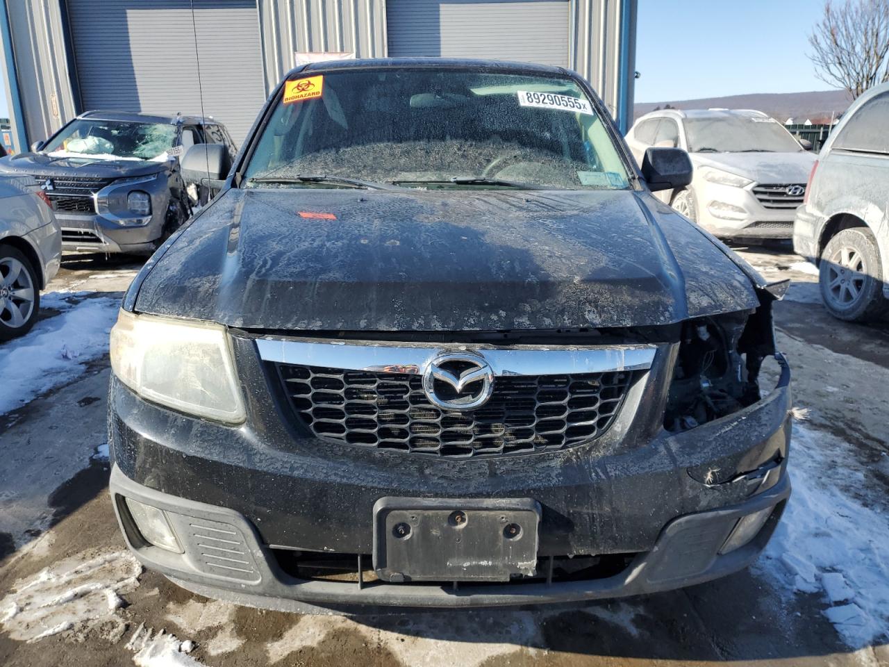 2010 Mazda Tribute VIN 4F2CY0C79AKM02670 Copart auction photo, front end damage thumbnail 5