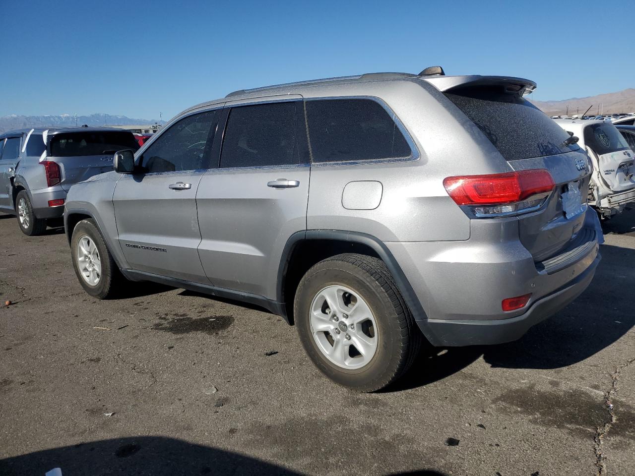 2017 Jeep Grand Cherokee VIN 1C4RJEAG1HC696228 Copart auction photo, side damage thumbnail 2