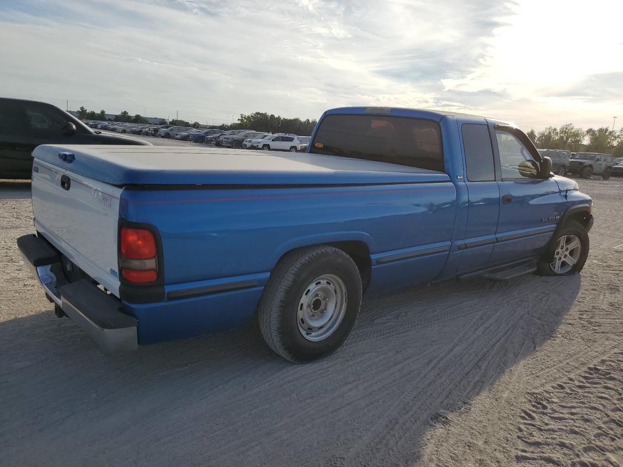 1999 Dodge RAM VIN 3B7HC13Y4XG163290 Copart auction photo, front end / side damage thumbnail 3