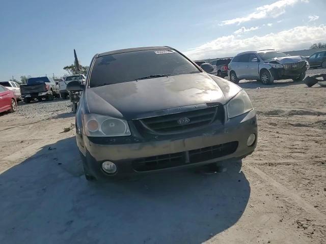 2004 KIA Spectra VIN KNAFE121745055316 Copart auction photo, all over damage thumbnail 11