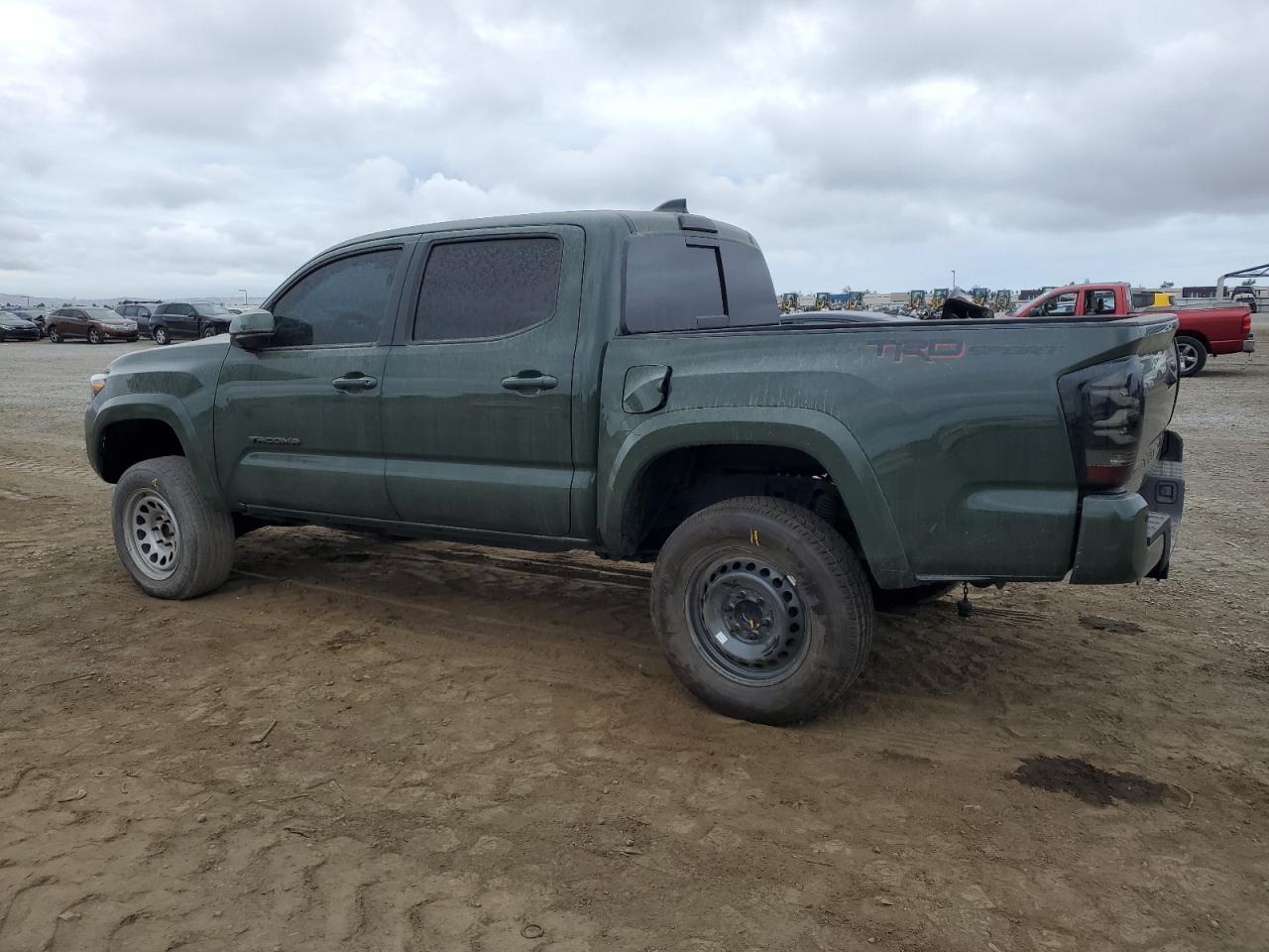 2022 Toyota Tacoma VIN 3TMAZ5CN7NM169239 Copart auction photo, minor dent/scratches / mechanical damage thumbnail 2