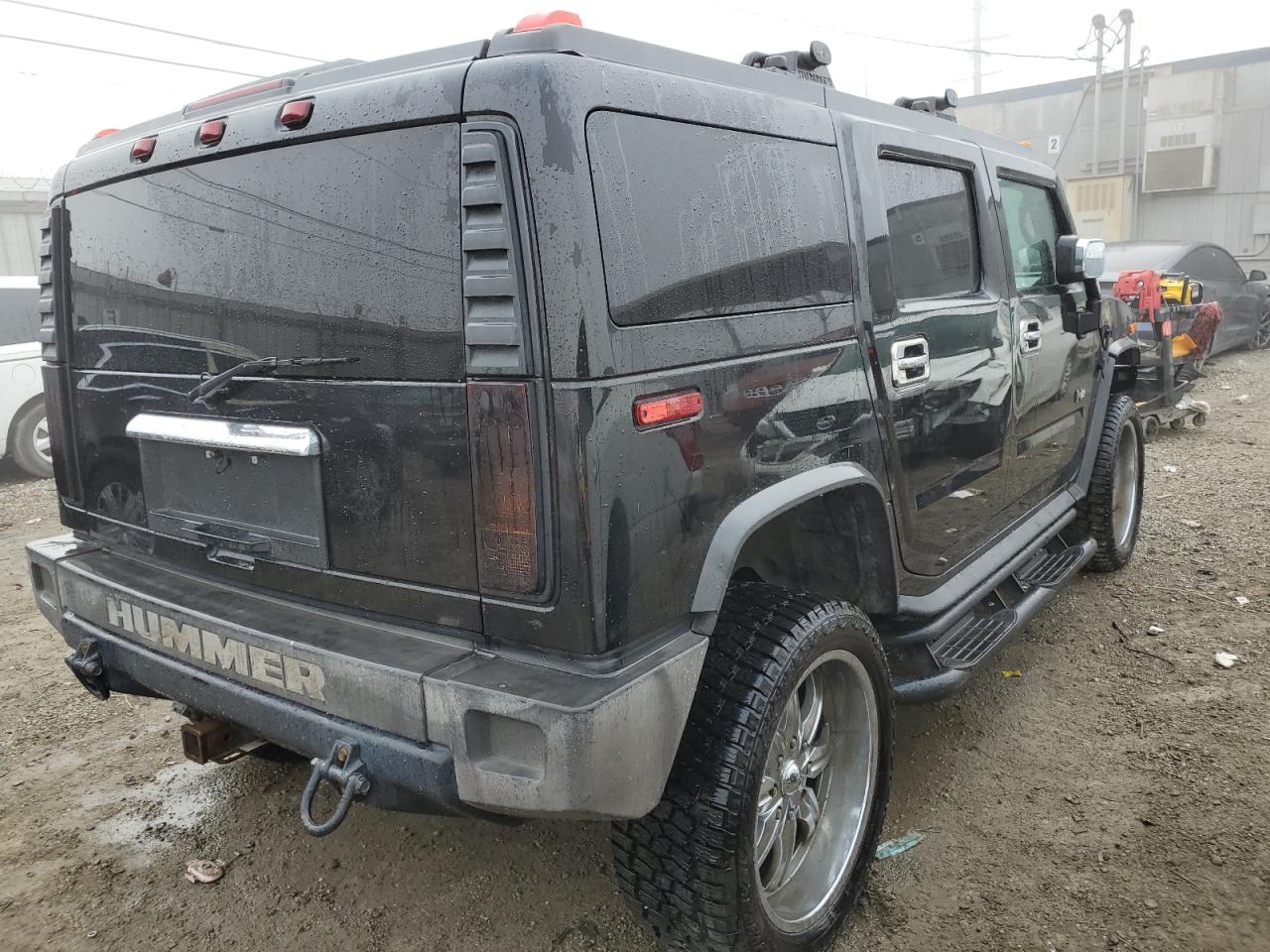 2003 Hummer H2 VIN 5GRGN23U83H143843 Copart auction photo, stripped damage thumbnail 3