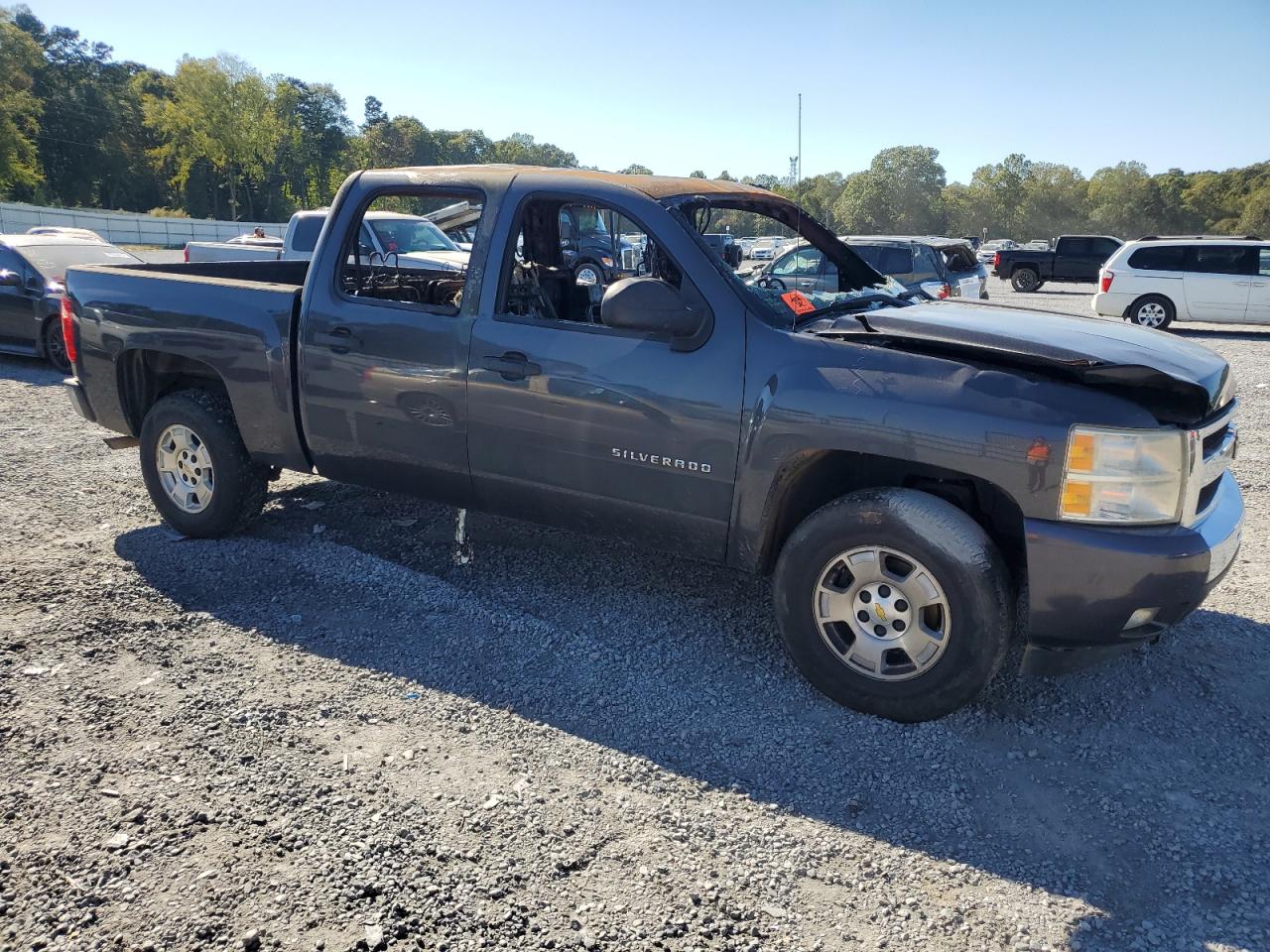 2011 Chevrolet Silverado VIN 3GCPCSE01BG173423 Copart auction photo, burn - interior damage thumbnail 4
