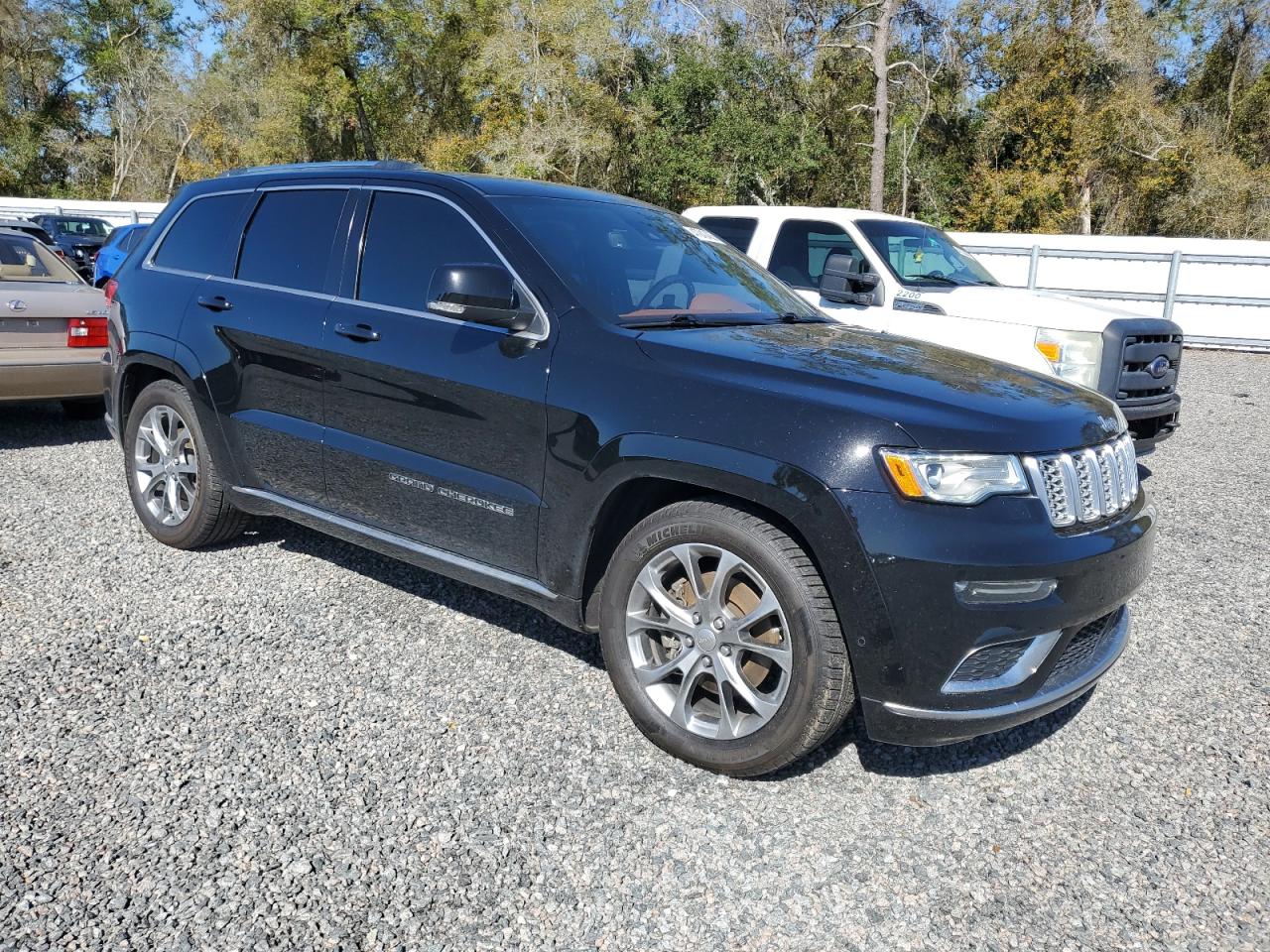 2019 Jeep Grand Cherokee VIN 1C4RJFJT4KC730401 Copart auction photo, minor dent/scratches damage thumbnail 4