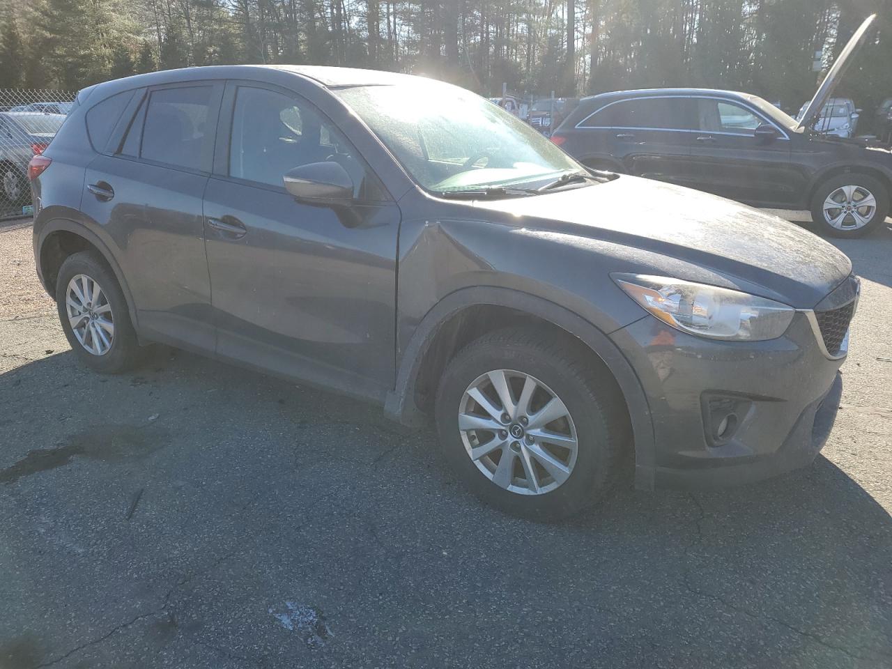 2015 Mazda CX-5 VIN JM3KE4CY1F0527869 Copart auction photo, side / minor dent/scratches damage thumbnail 4