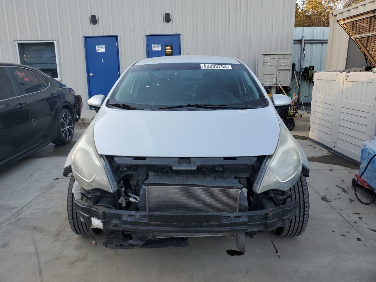 2013 KIA Rio VIN KNADN4A34D6132990 Copart auction photo, front end / minor dent/scratches damage thumbnail 5