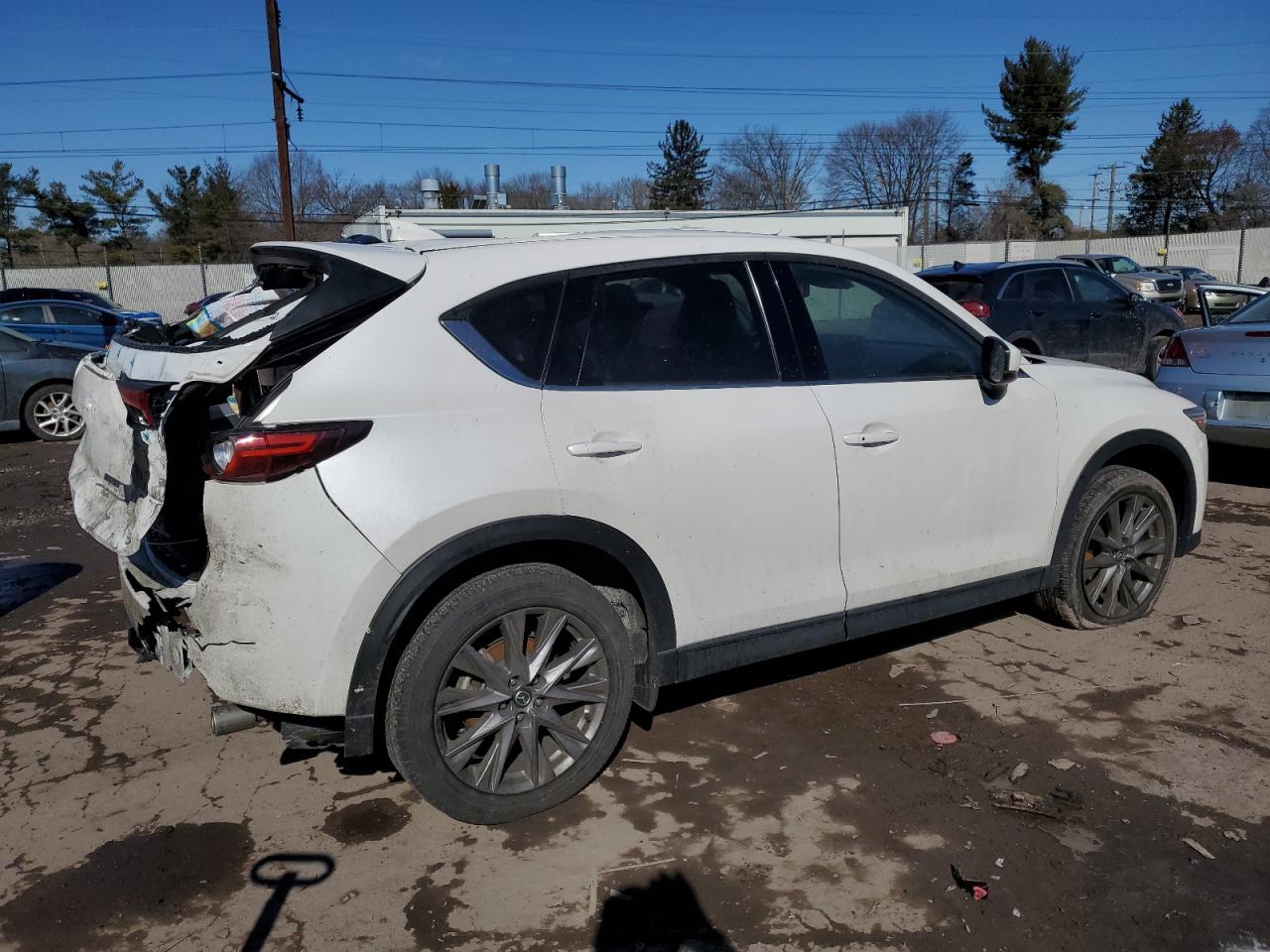 2021 Mazda CX-5 VIN JM3KFBDM4M1427558 Copart auction photo, rear end / side damage thumbnail 3