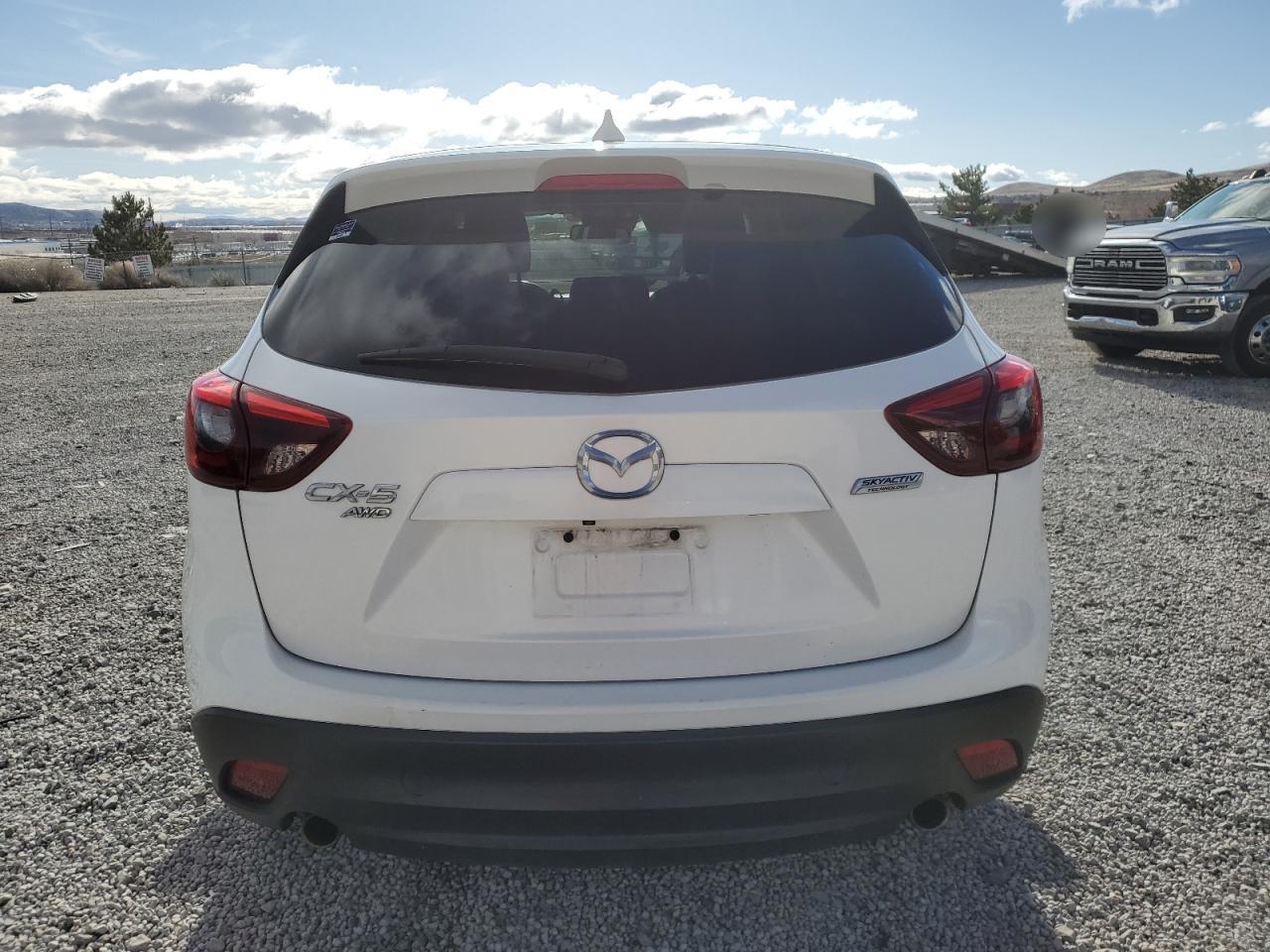 2016 Mazda CX-5 VIN JM3KE4DY3G0672069 Copart auction photo, side / front end damage thumbnail 6