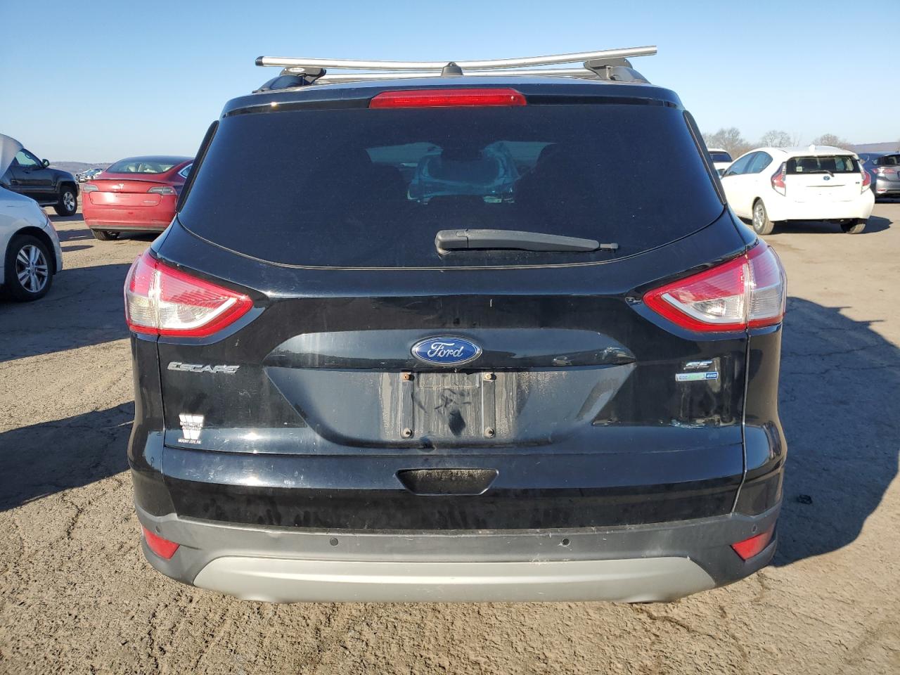 2016 Ford Escape VIN 1FMCU9GX9GUA58969 Copart auction photo, front end / top/roof damage thumbnail 6