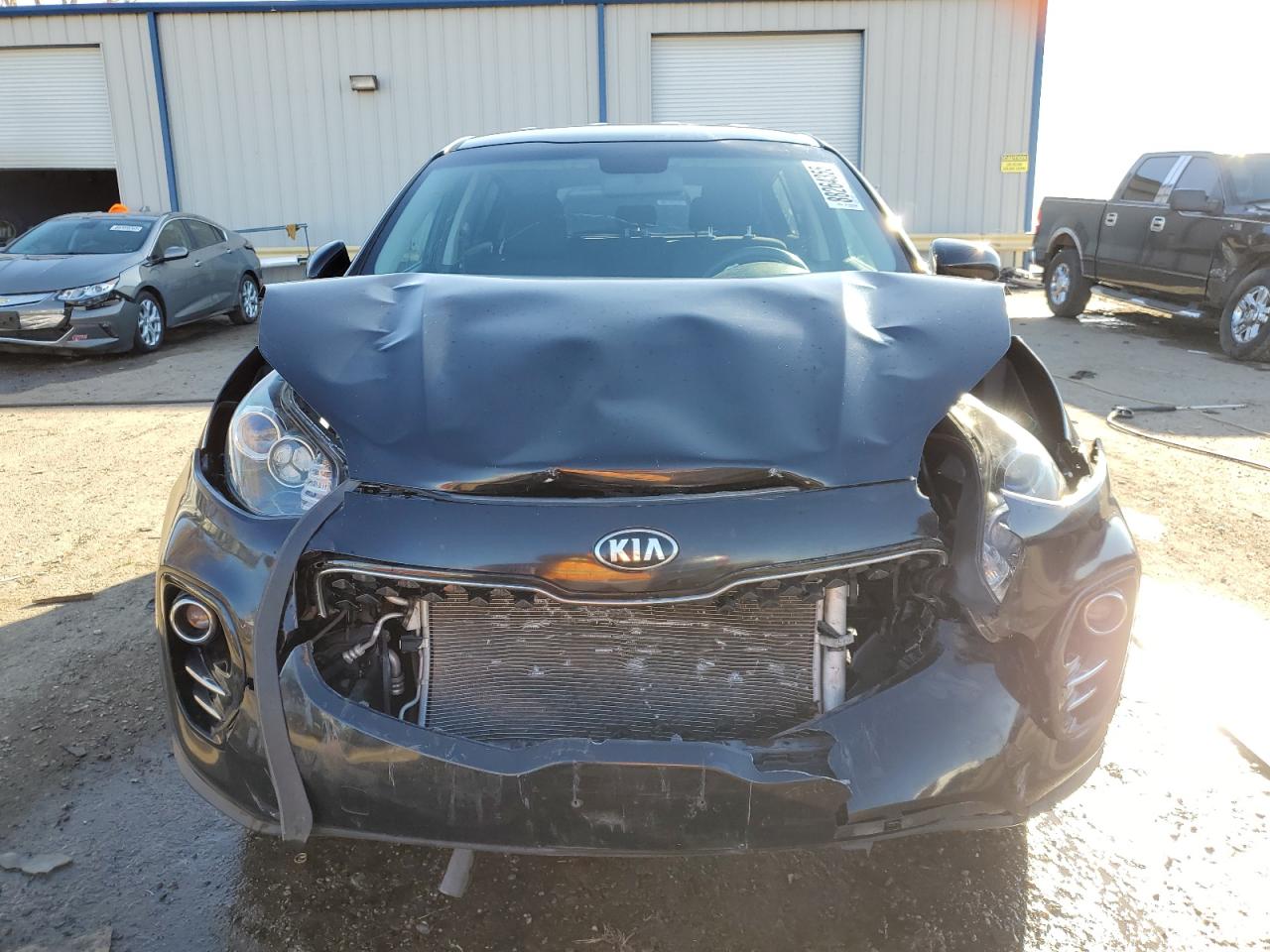 2017 KIA Sportage VIN KNDPMCAC6H7229038 Copart auction photo, front end damage thumbnail 5