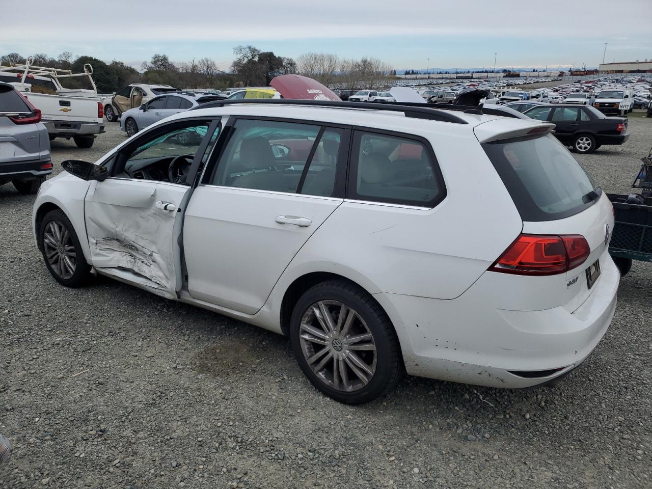 2015 Volkswagen Golf VIN 3VWCA7AU0FM510596 Copart auction photo, side / all over damage thumbnail 2