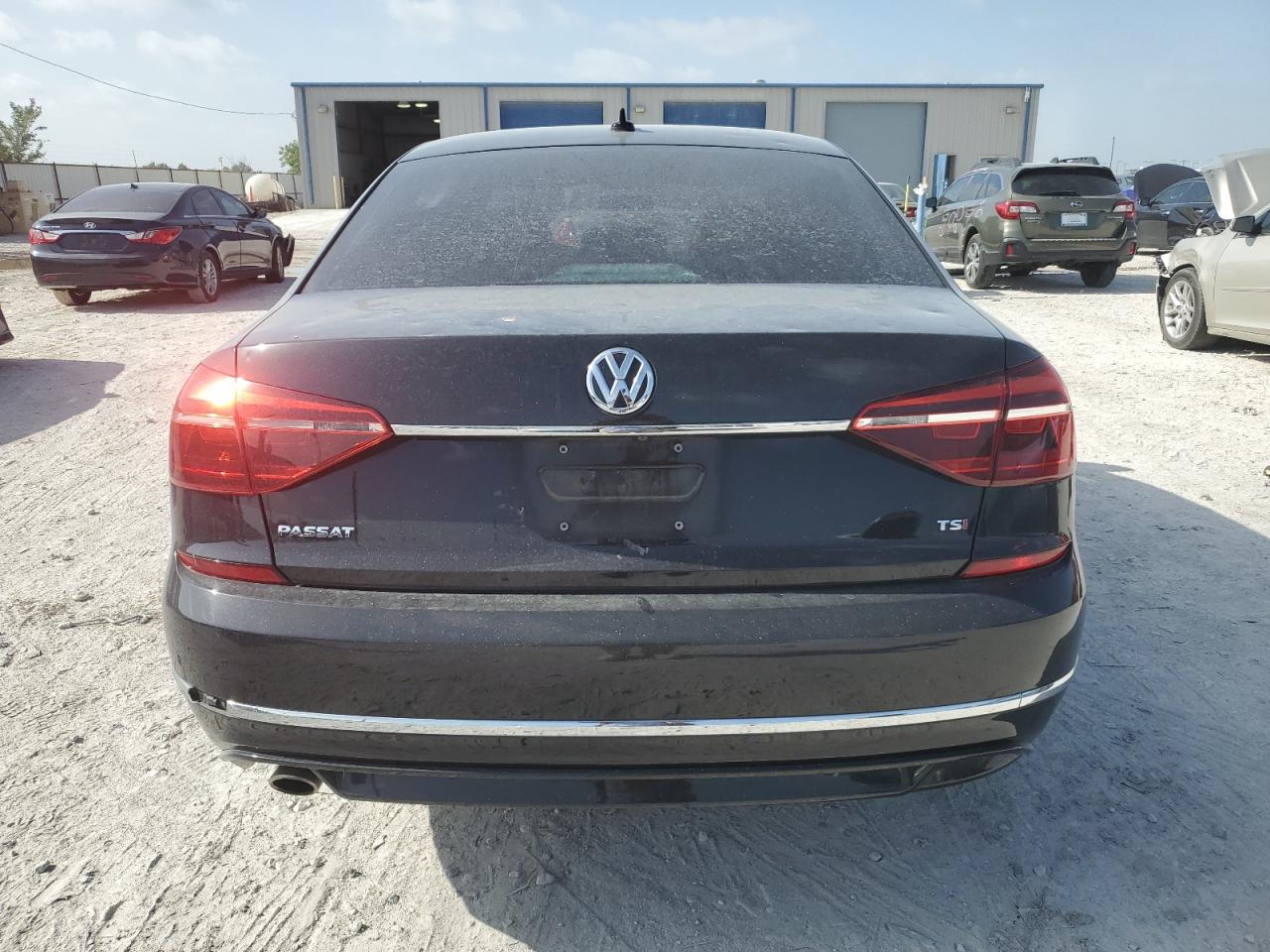 2017 Volkswagen Passat VIN 1VWDT7A3XHC066590 Copart auction photo, hail damage thumbnail 6