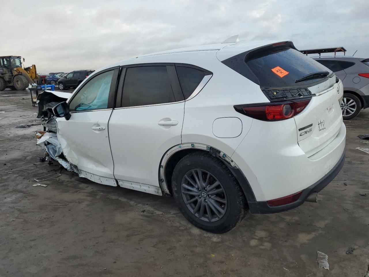 2019 Mazda CX-5 VIN JM3KFACM2K0697466 Copart auction photo, all over damage thumbnail 2