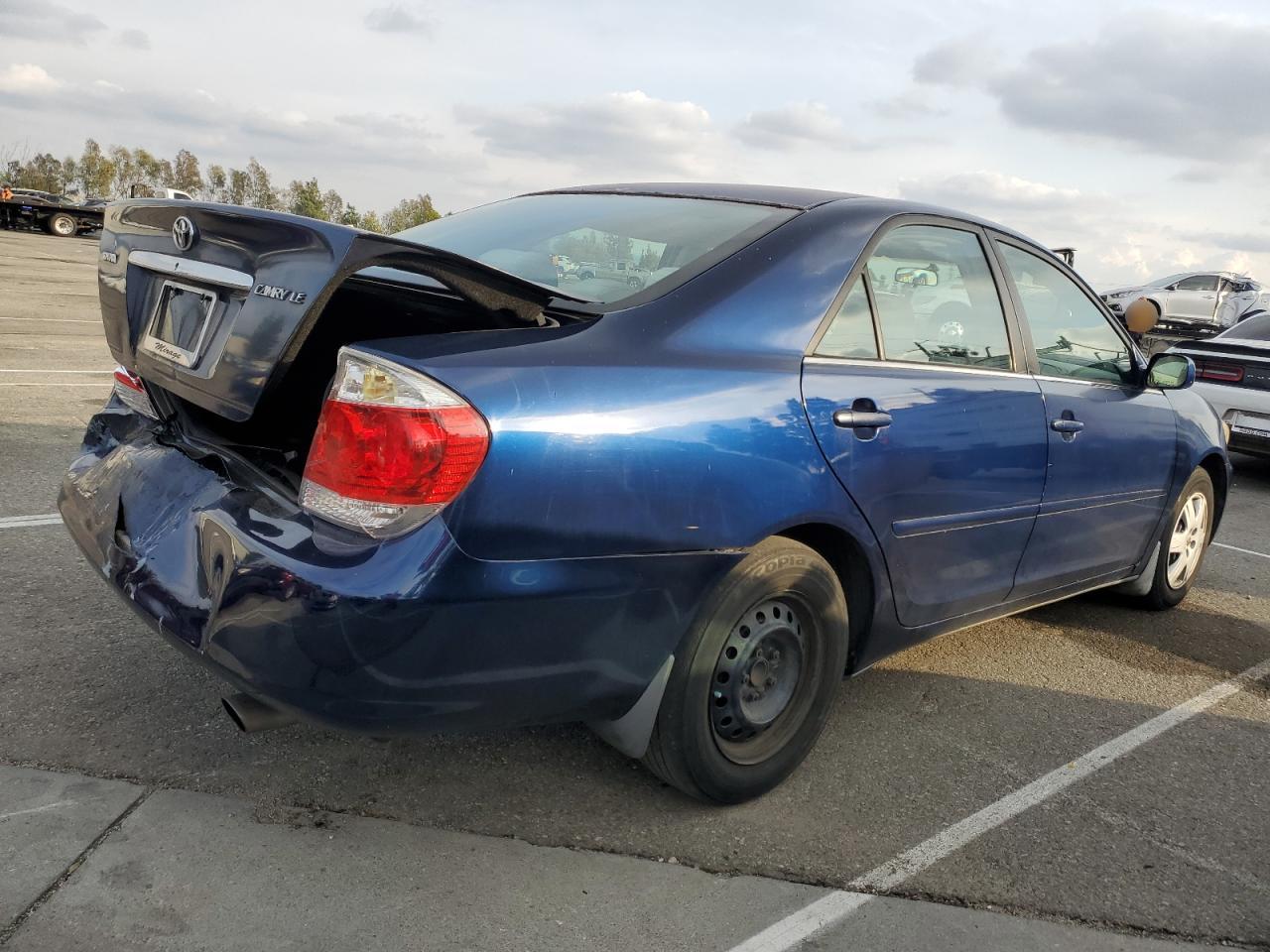 2005 Toyota Camry VIN 4T1BE32K65U384467 Copart auction photo, rear end damage thumbnail 3