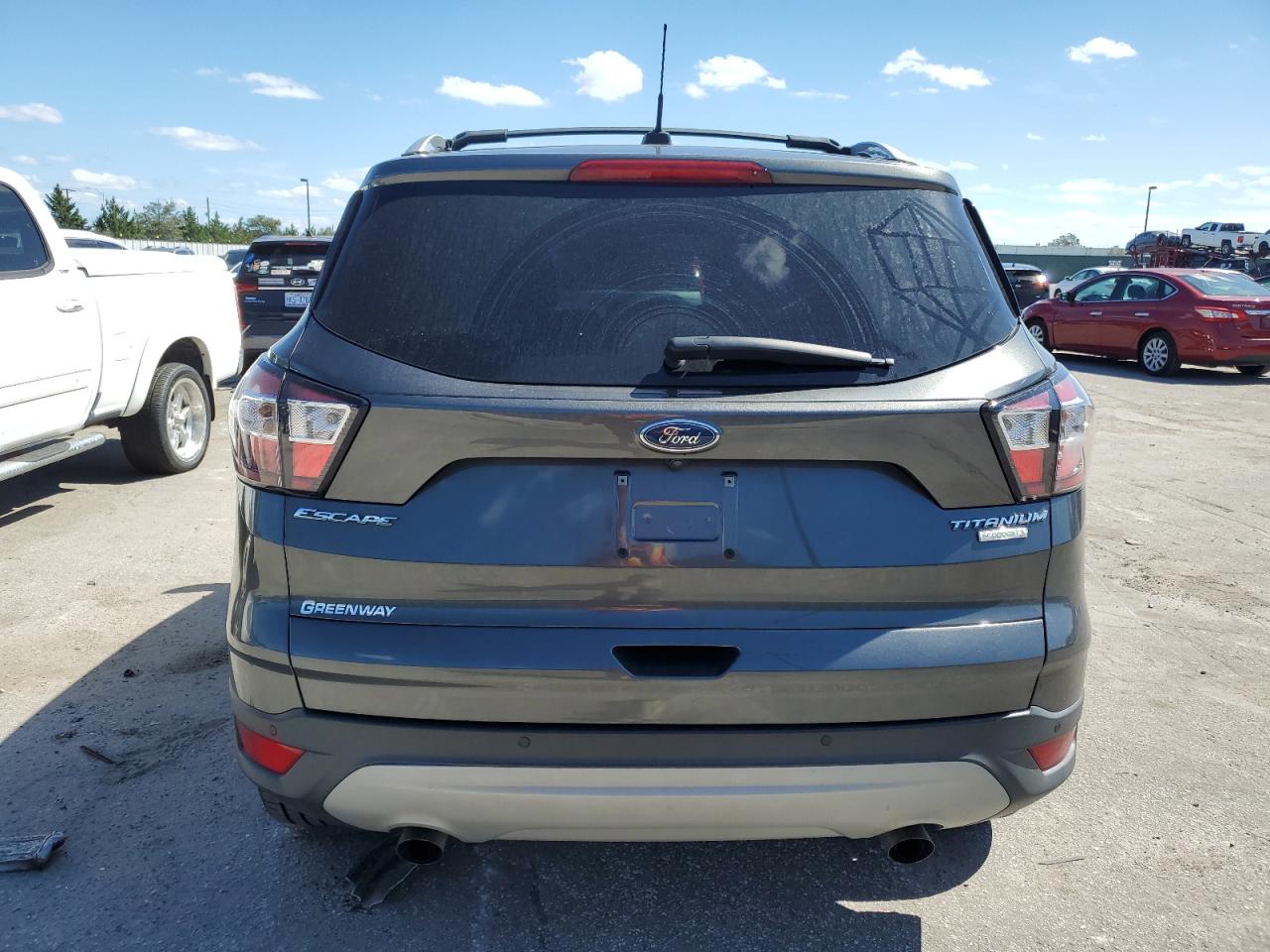 2017 Ford Escape VIN 1FMCU0JD5HUB12862 Copart auction photo, water/flood damage thumbnail 6