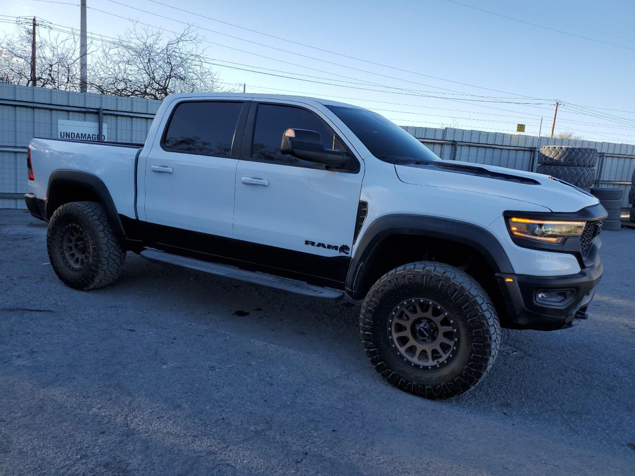 2022 RAM 1500 VIN 1C6SRFU91NN318396 Copart auction photo, vandalism damage thumbnail 4