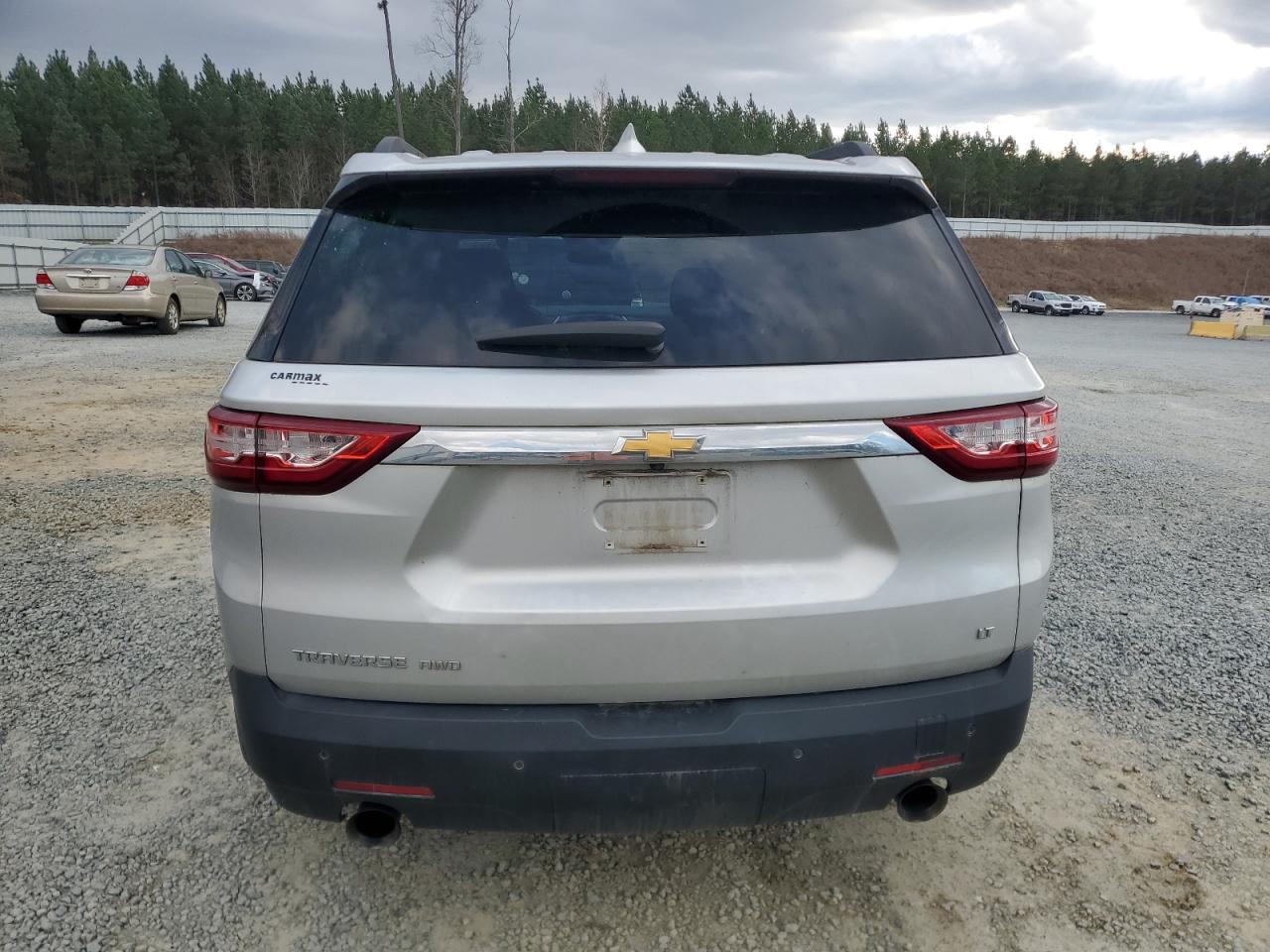 2019 Chevrolet Traverse VIN 1GNEVGKW9KJ170587 Copart auction photo, all over damage thumbnail 6