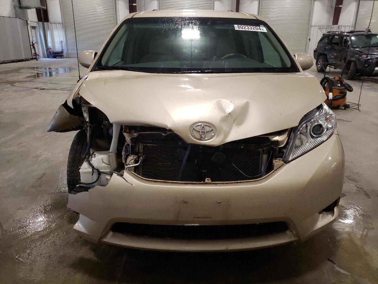 2014 Toyota Sienna VIN 5TDJK3DC7ES075710 Copart auction photo, front end / side damage thumbnail 5
