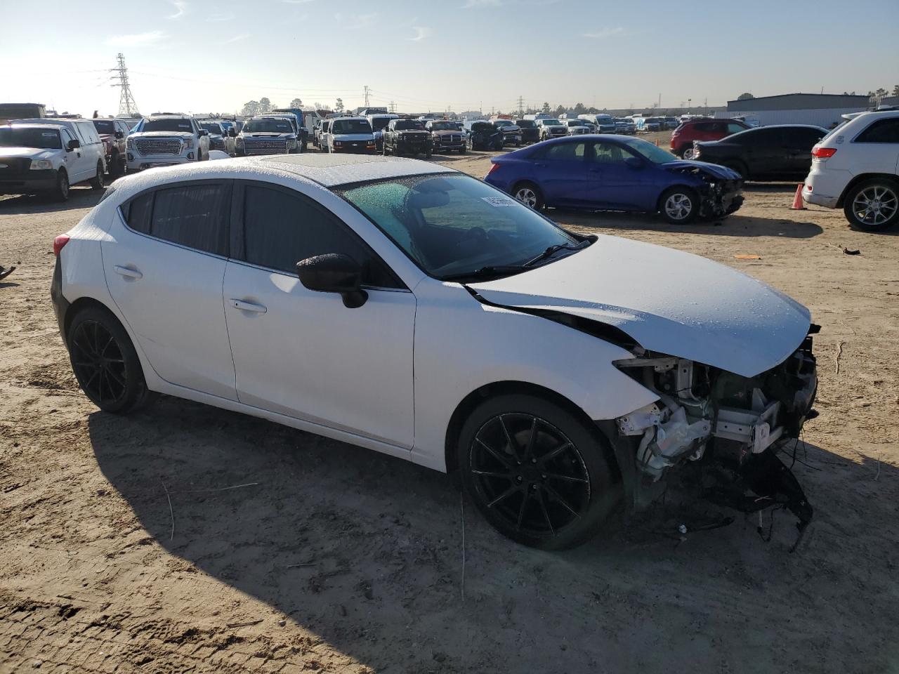 2015 Mazda 3 VIN JM1BM1M30F1260991 Copart auction photo, all over / side damage thumbnail 4