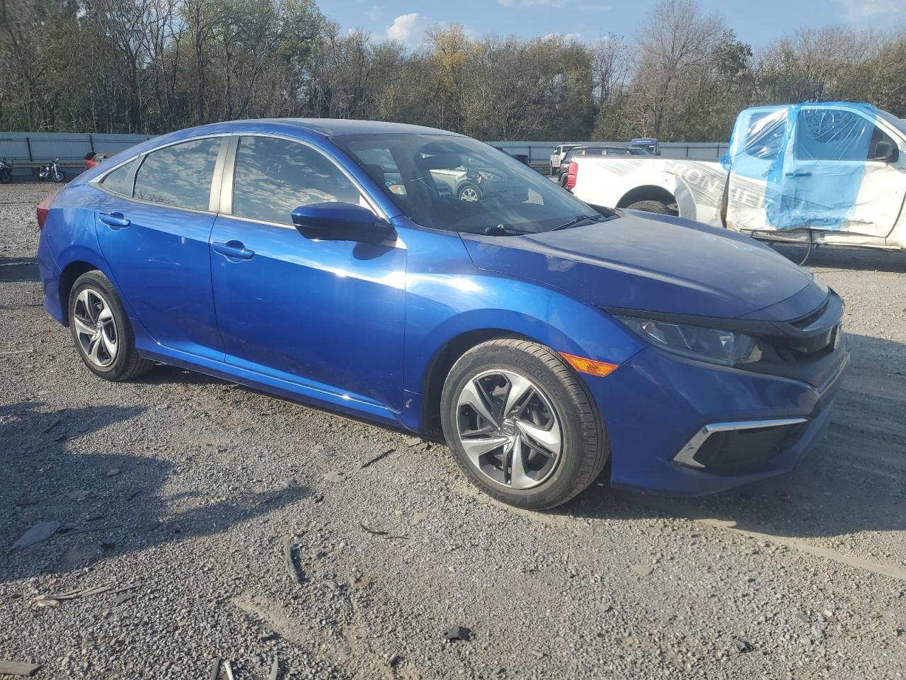 2020 Honda Civic VIN 2HGFC2F67LH565999 Copart auction photo, water/flood / all over damage thumbnail 4