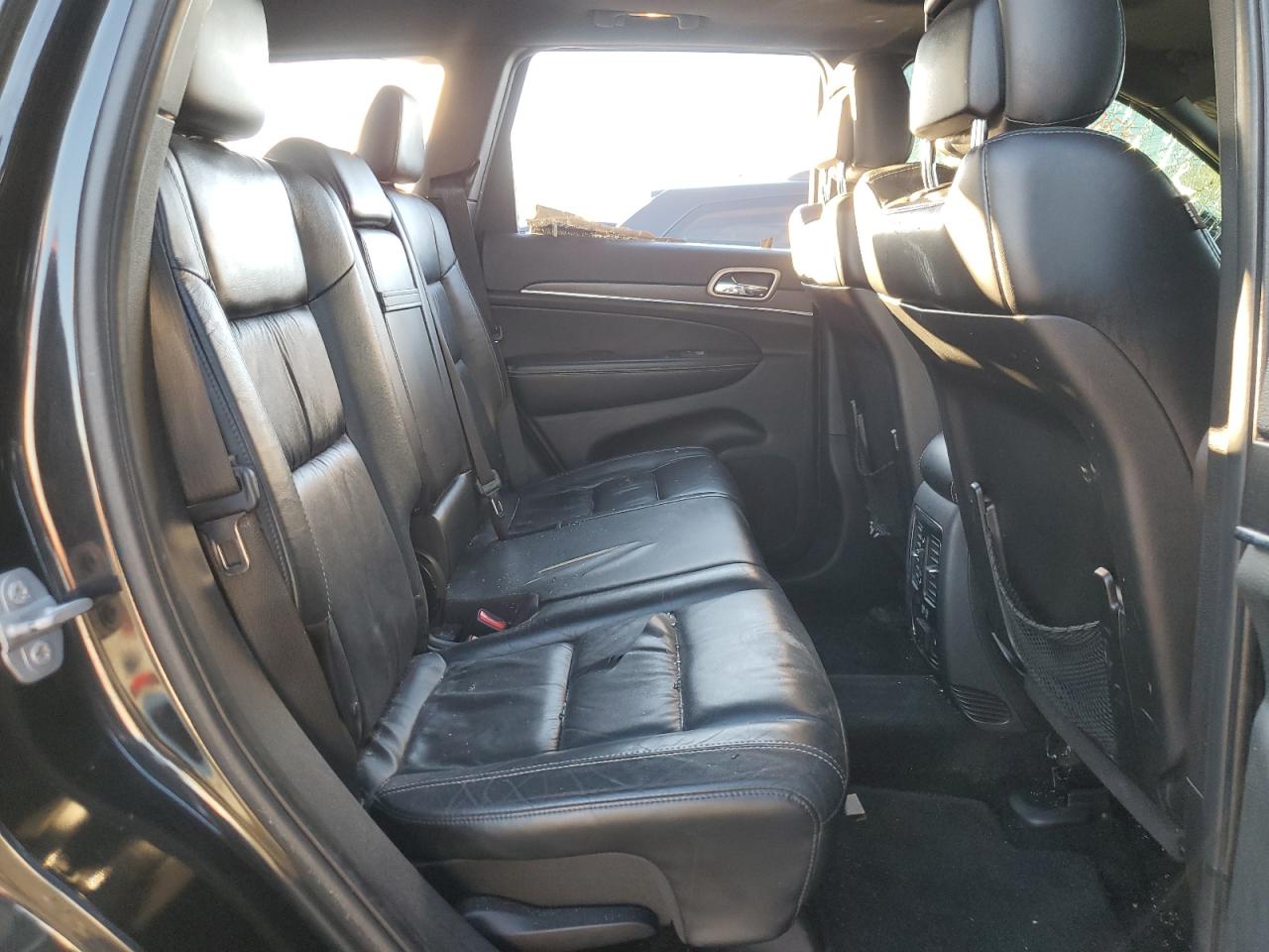 2015 Jeep Grand Cherokee VIN 1C4RJFBG9FC839525 Copart auction photo, vandalism damage thumbnail 11