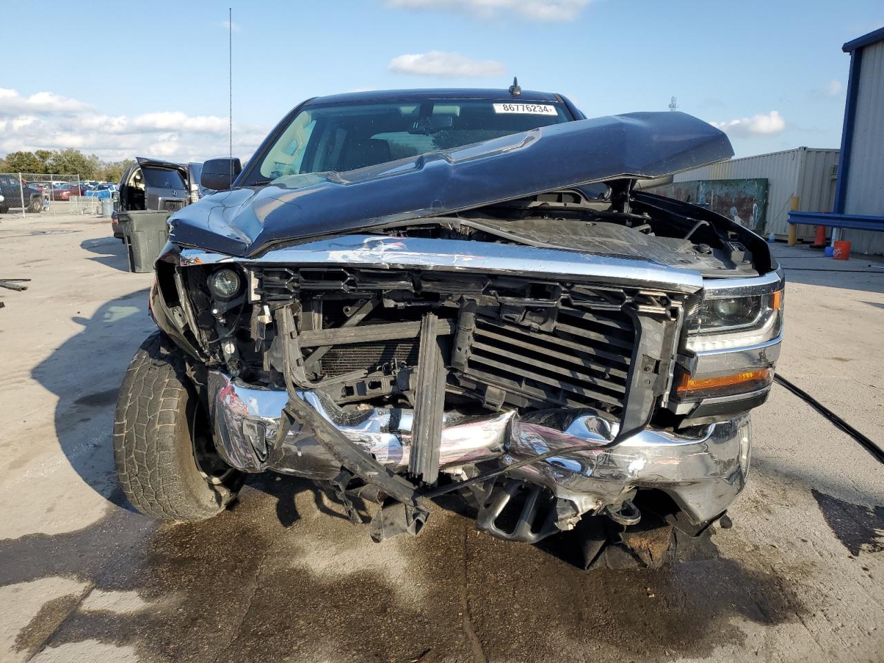 2018 Chevrolet Silverado VIN 3GCUKREC7JG570982 Copart auction photo, front end / side damage thumbnail 5