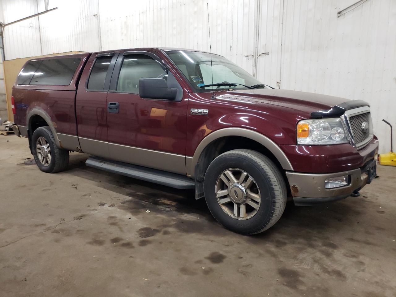 2005 Ford F-150 VIN 1FTPX14565FA06511 Copart auction photo, normal wear damage thumbnail 4
