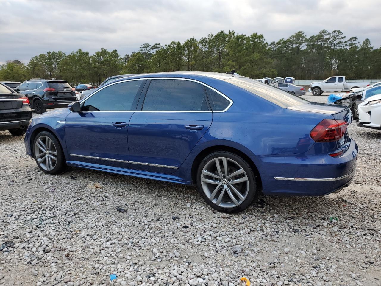 2017 Volkswagen Passat VIN 1VWDT7A3XHC052723 Copart auction photo, side / minor dent/scratches damage thumbnail 2