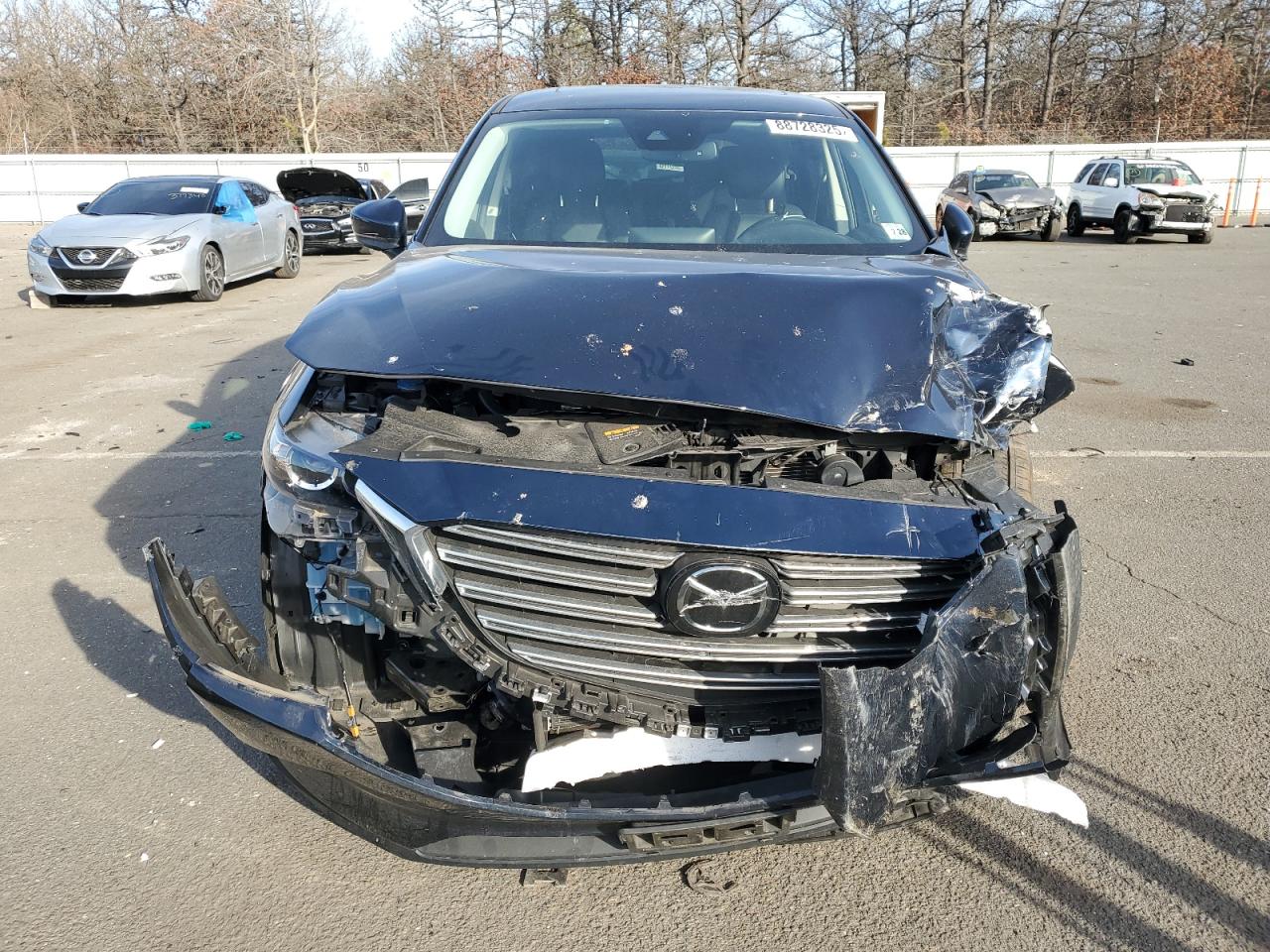2023 Mazda CX-9 VIN JM3TCBCY6P0639471 Copart auction photo, front end / minor dent/scratches damage thumbnail 5